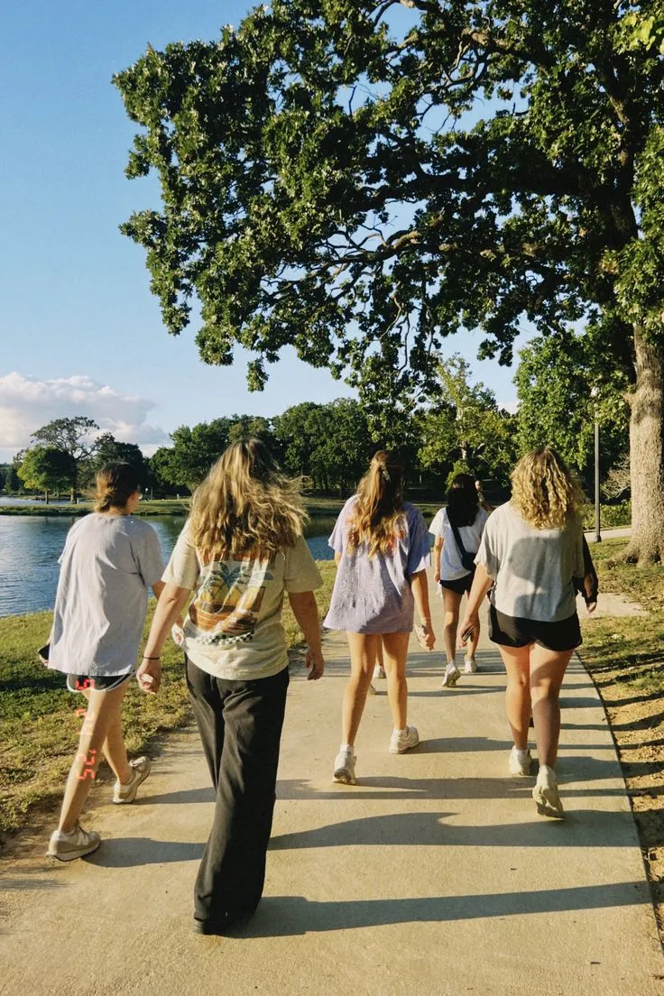 Group members walking through an open plaza
